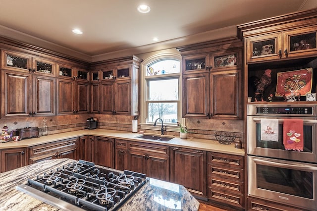 1225 Chloe Dr, Gallatin, TN 37066 - kitchen featuring tasteful backsplash, appliances with stainless steel finishes, dark brown cabinets, and a sink