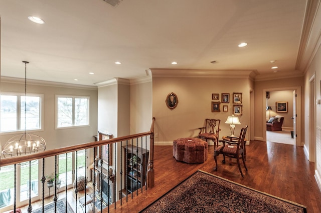 1225 Chloe Dr, Gallatin, TN 37066 - hallway featuring baseboards, ornamental molding, wood finished floors, and a notable chandelier