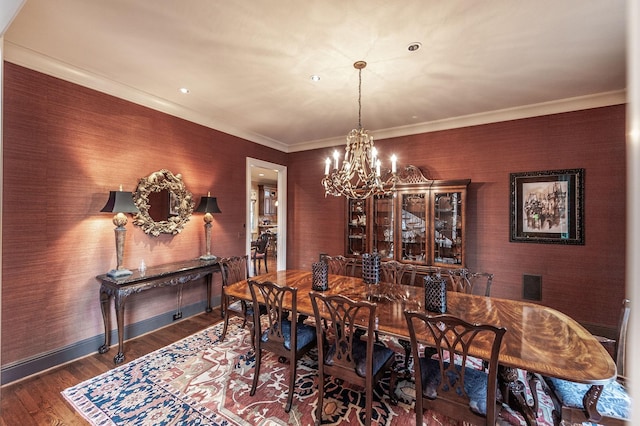 1225 Chloe Dr, Gallatin, TN 37066 - dining room with dark wood-style floors, a chandelier, ornamental molding, and baseboards