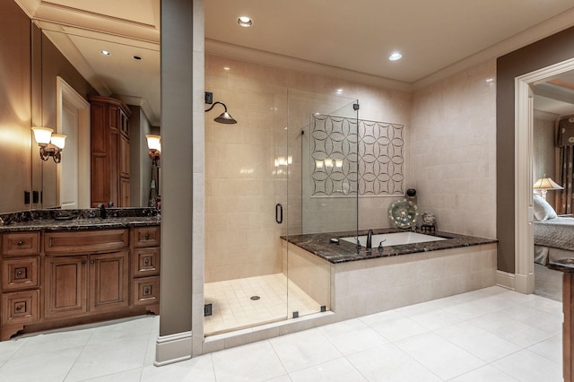 1225 Chloe Dr, Gallatin, TN 37066 - bathroom featuring tile patterned flooring, a garden tub, vanity, ornamental molding, and a shower stall
