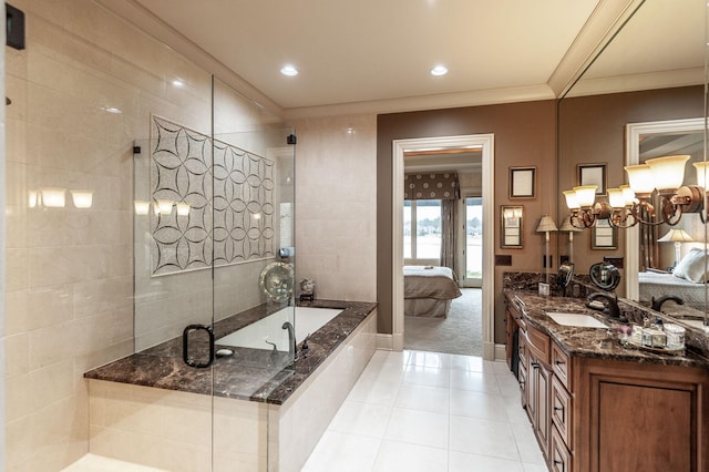 1225 Chloe Dr, Gallatin, TN 37066 - bathroom with vanity, ornamental molding, a bath, a stall shower, and ensuite bath