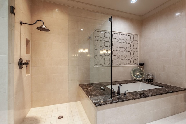 1225 Chloe Dr, Gallatin, TN 37066 - bathroom with crown molding, a garden tub, a tile shower, and tile walls
