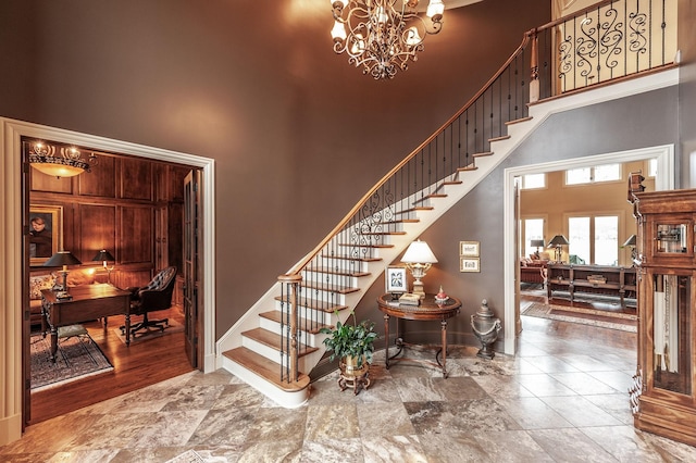 1225 Chloe Dr, Gallatin, TN 37066 - stairs featuring baseboards, a notable chandelier, and a high ceiling