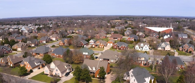 birds eye view of property with a residential view