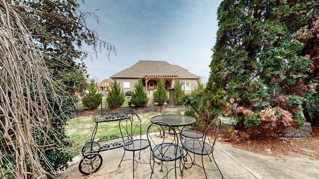 view of patio with fence