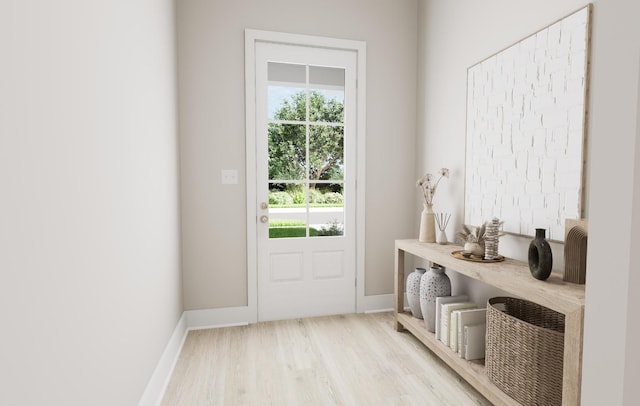 doorway to outside with light wood-type flooring and baseboards