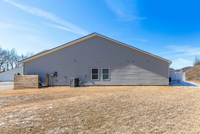 view of home's exterior with central AC