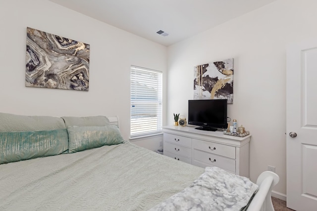 bedroom with visible vents