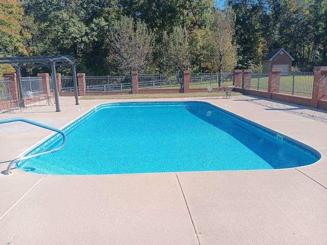 view of pool featuring a fenced in pool, fence, and a pergola