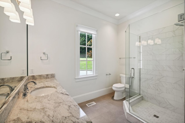 full bathroom with visible vents, toilet, a stall shower, vanity, and baseboards