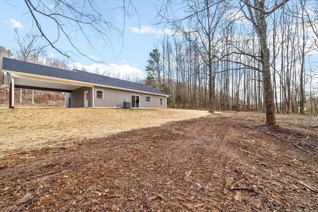 exterior space with a carport