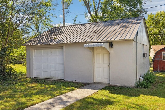 detached garage with fence