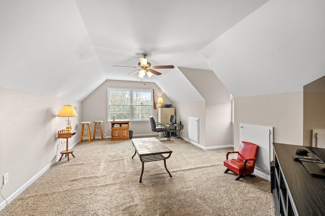 living area featuring carpet flooring, vaulted ceiling, and baseboards