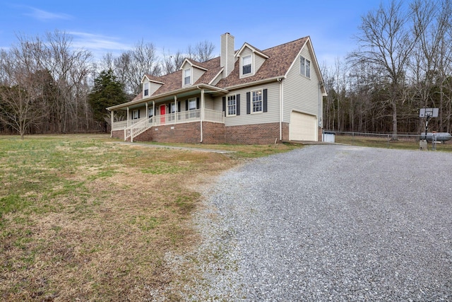 cape cod-style house with brick siding, gravel driveway, an attached garage, a porch, and a front yard