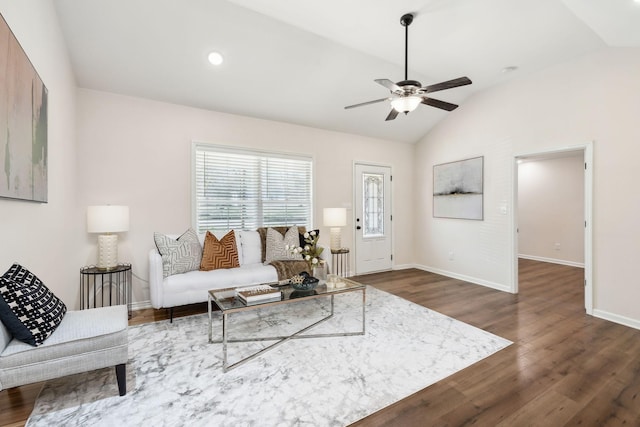 living area with baseboards, a ceiling fan, lofted ceiling, dark wood-style floors, and recessed lighting