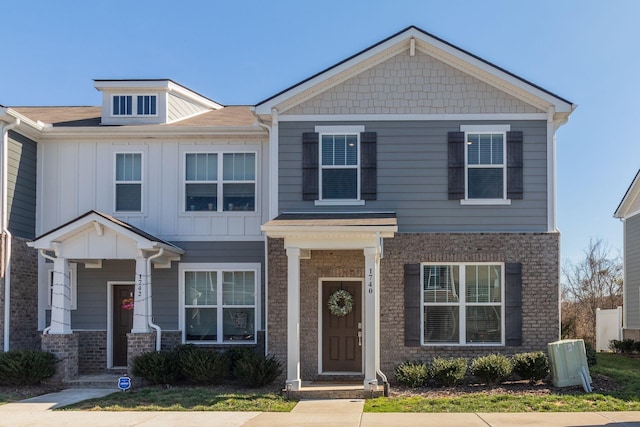 craftsman-style house with board and batten siding