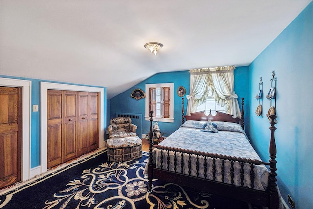 bedroom featuring vaulted ceiling