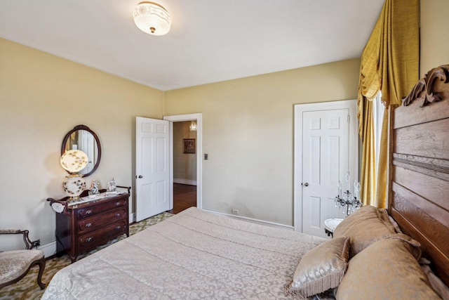 bedroom with baseboards