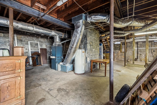 unfinished below grade area featuring gas water heater, electric panel, and heating unit