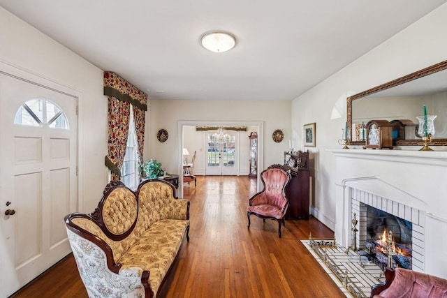 interior space with a fireplace and dark wood finished floors