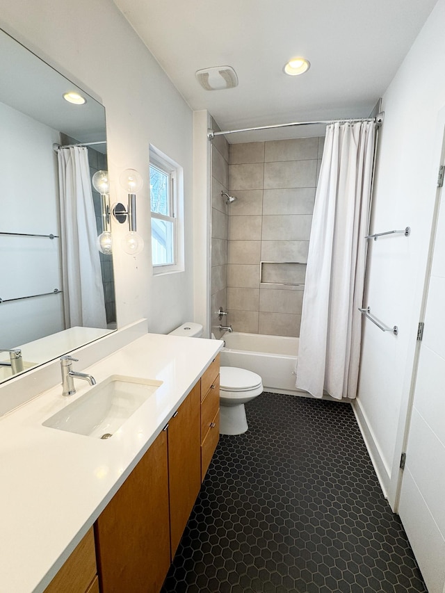 bathroom featuring toilet, recessed lighting, visible vents, vanity, and shower / bathtub combination with curtain