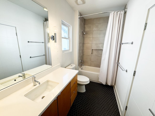 full bath featuring shower / tub combo, vanity, and toilet