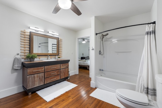 full bathroom featuring toilet, ensuite bathroom, ceiling fan, vanity, and wood finished floors