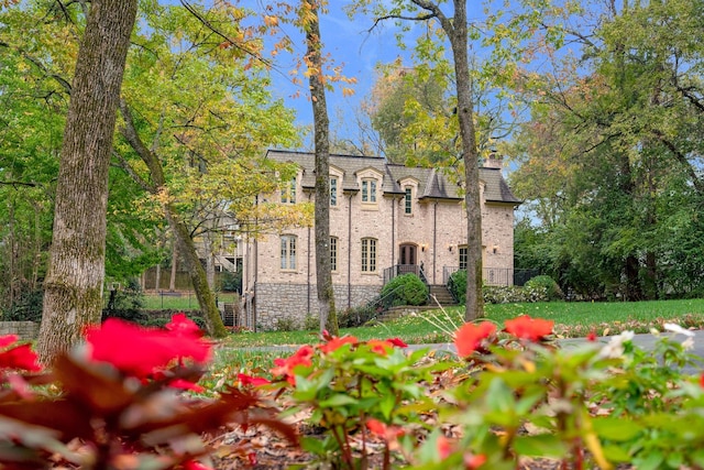 view of front of property featuring a chimney