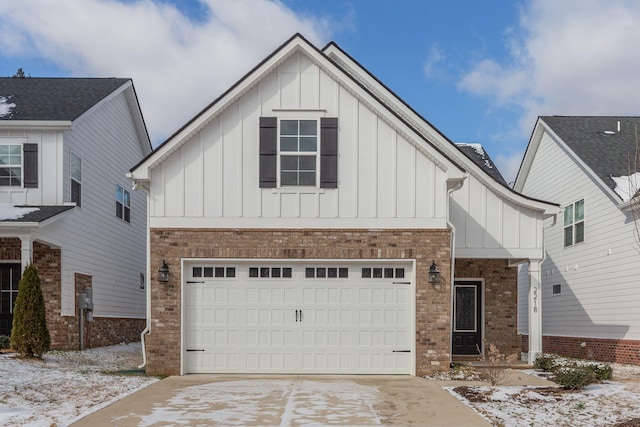 modern farmhouse style home featuring board and batten siding, concrete driveway, and brick siding