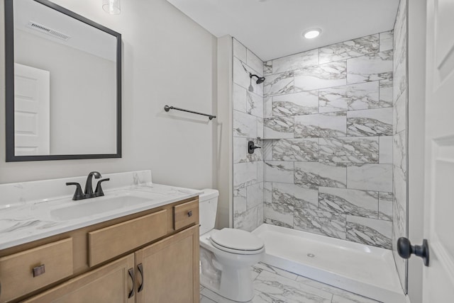 348 Welchwood Dr, Clarksville, TN 37040 - full bath featuring a shower stall, marble finish floor, toilet, vanity, and visible vents
