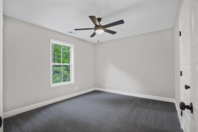 348 Welchwood Dr, Clarksville, TN 37040 - spare room with baseboards, visible vents, dark colored carpet, and ceiling fan