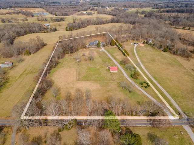 birds eye view of property featuring a rural view