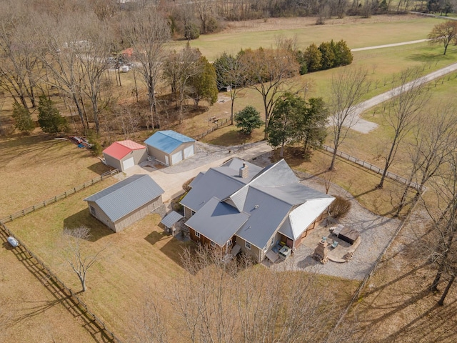 birds eye view of property featuring a rural view