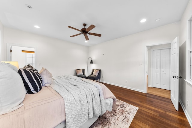 bedroom featuring baseboards, wood finished floors, a ceiling fan, and recessed lighting