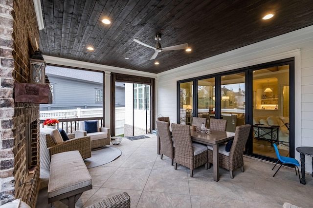 view of patio / terrace featuring ceiling fan, an outdoor living space, and outdoor dining space