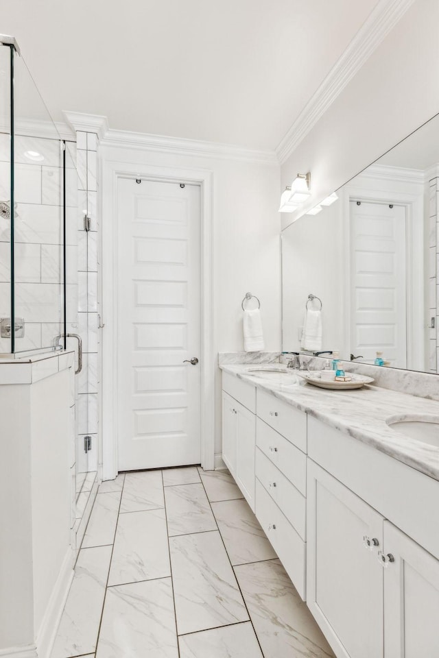 full bath with double vanity, a stall shower, ornamental molding, marble finish floor, and a sink