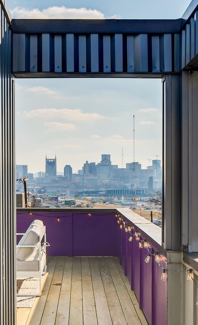 balcony featuring a view of city