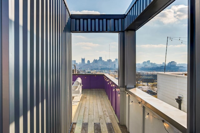 balcony featuring a city view