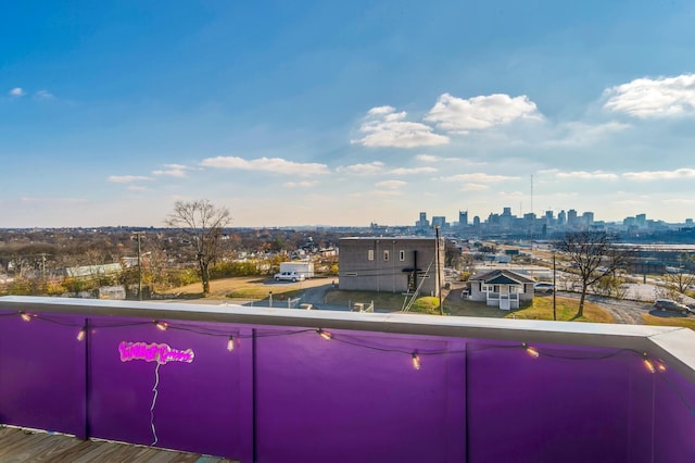 view of pool featuring a view of city