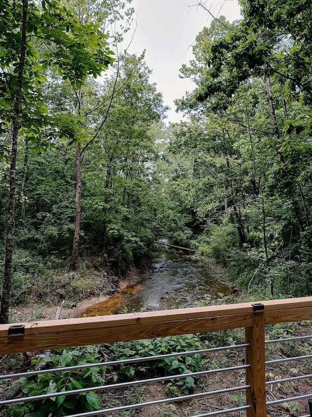 property view of water with a view of trees