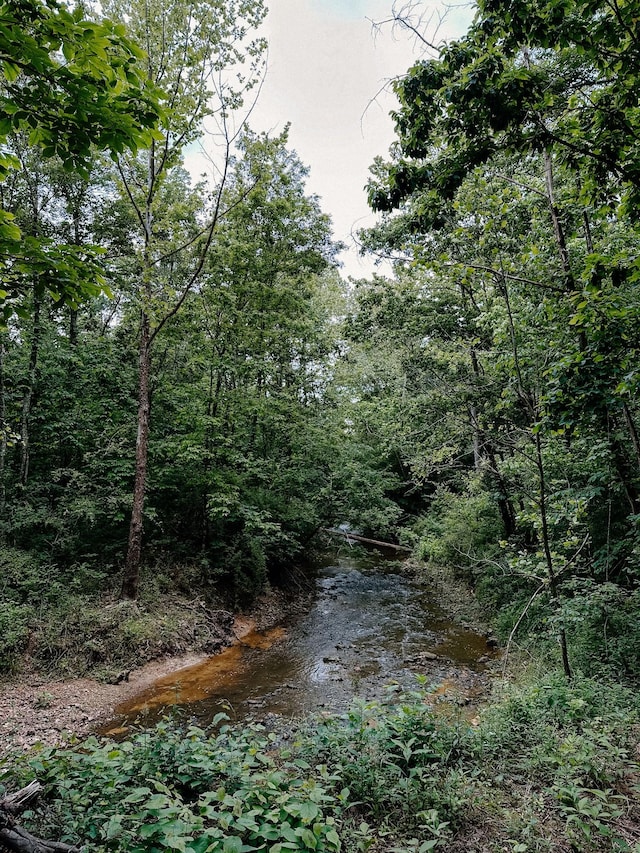 view of landscape with a view of trees