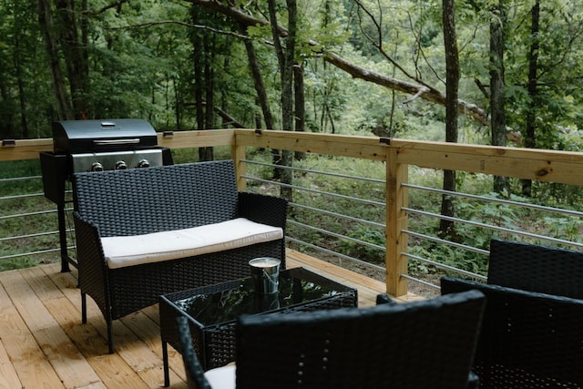 wooden deck with grilling area