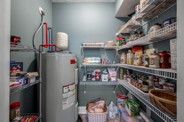 pantry with electric water heater