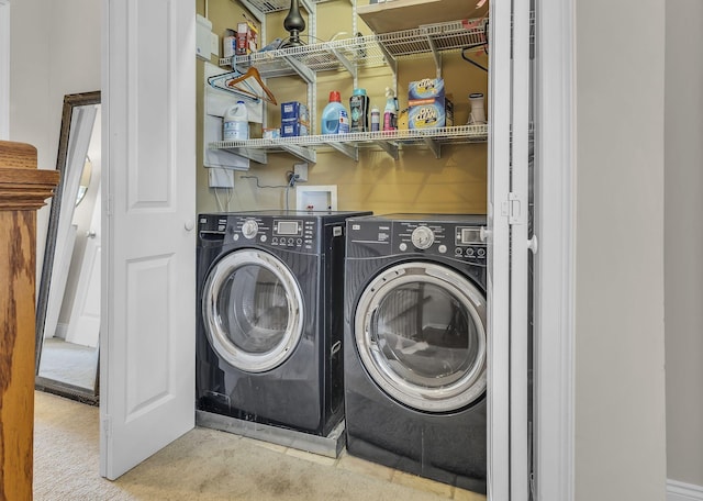 2112 Acklen Ave Unit 201, Nashville, TN 37212 - laundry room with laundry area and washer and dryer