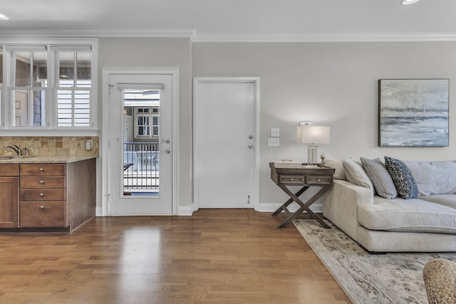 2112 Acklen Ave Unit 201, Nashville, TN 37212 - living room with baseboards, wood finished floors, and crown molding