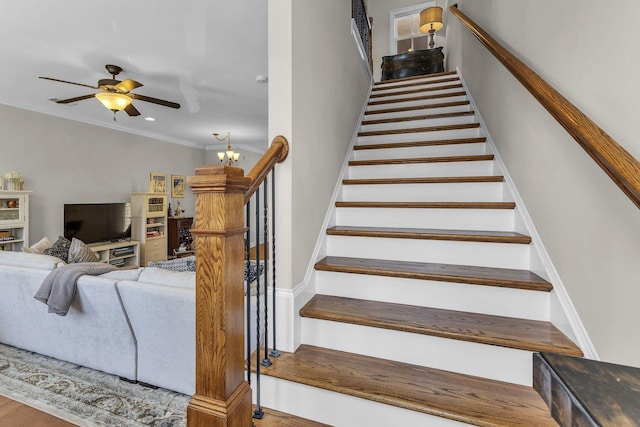 2112 Acklen Ave Unit 201, Nashville, TN 37212 - stairs with crown molding and ceiling fan with notable chandelier
