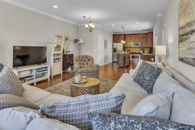 2112 Acklen Ave Unit 201, Nashville, TN 37212 - living area with ornamental molding, recessed lighting, a notable chandelier, and dark wood finished floors