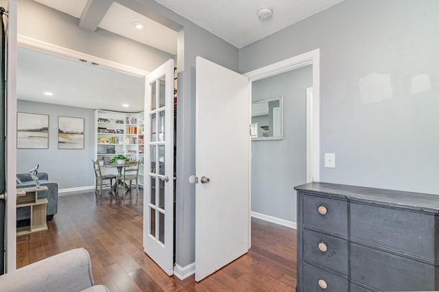 hallway with recessed lighting, french doors, dark wood finished floors, and baseboards