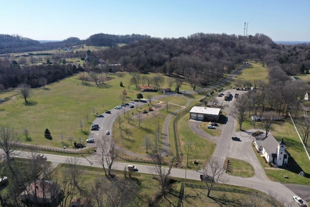 birds eye view of property featuring a rural view