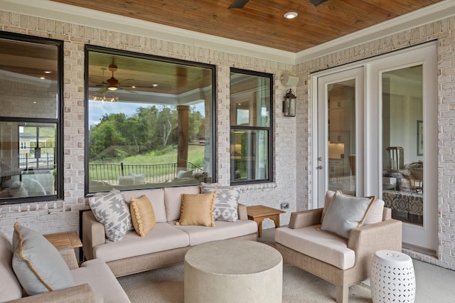 view of patio featuring an outdoor hangout area and ceiling fan